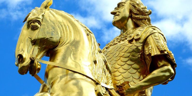 Royalty - Golden Statue Under Blue Skies during Day Time