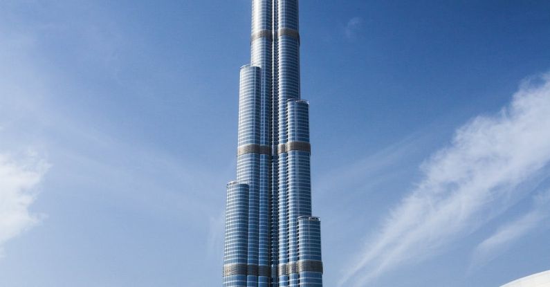 Dubai - Blue and Gray High Rise Building