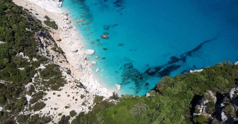Sardinia - Aerial Photography of Sea Water and Cliff