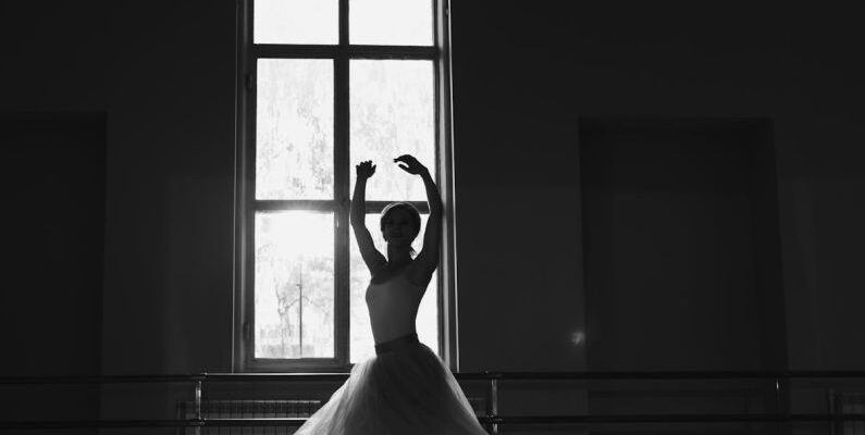 Manor - Woman Dancing beside the Window