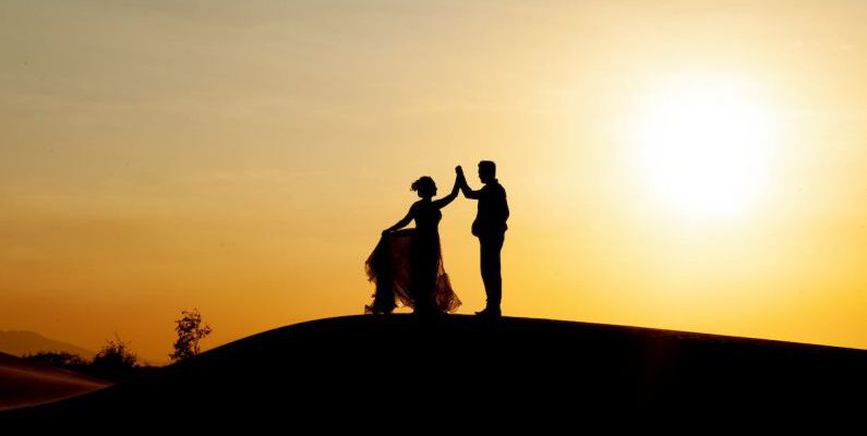 Sunset - Silhouette of Newly Wedded Couple